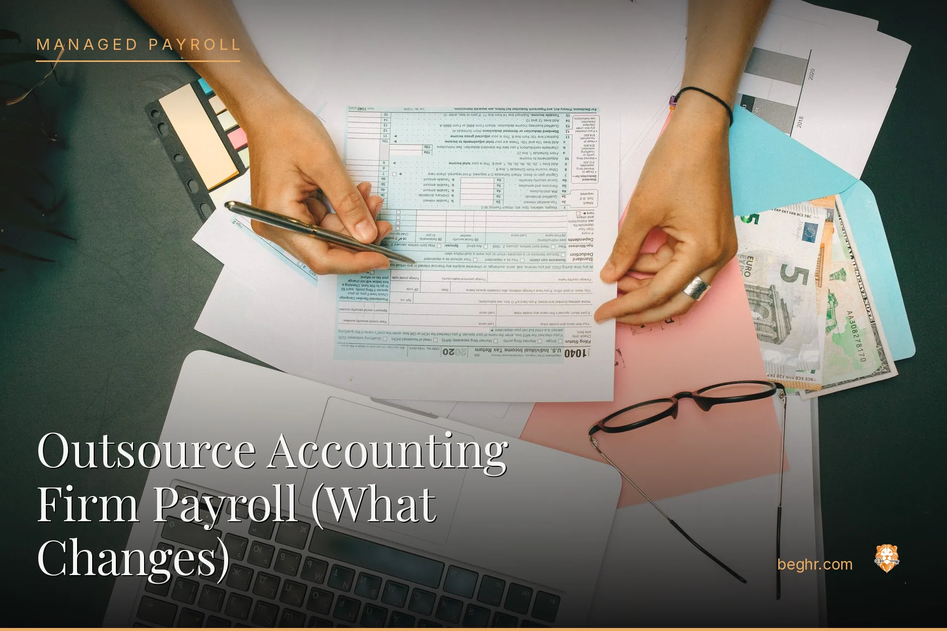 An accountant reviewing spreadsheets and documents at a desk