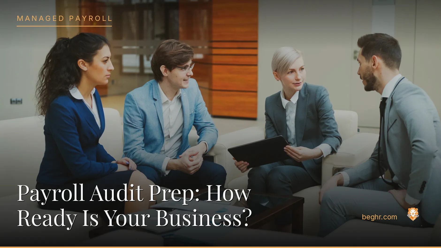 Business professionals reviewing payroll and HR documents in a bright modern office